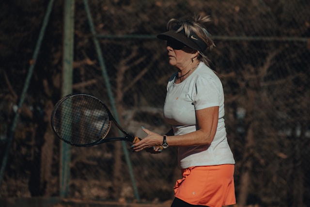 Community tennis court with diverse players